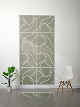 Sage green felt sheet with white engraved topographic line pattern in grid layout.