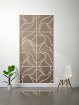 Tan felt sheet with white engraved topographic contour lines arranged in a grid pattern.