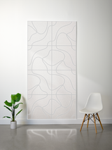 Cream-colored felt sheet with engraved topographic line pattern and grid divisions creating a layered wall panel design.
