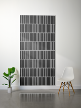 Thick felt sheet with layered engraved pattern creating offset vertical and horizontal lines in charcoal gray and white.