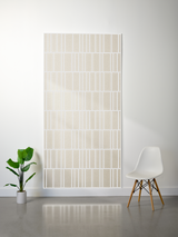 Cream felt sheet with white engraved vertical and horizontal line pattern creating offset rectangular segments.