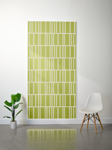 Lime green felt sheet with white engraved vertical lines in offset pattern arrangement.