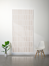 Beige felt sheet with white engraved line pattern creating offset rectangular sections throughout.