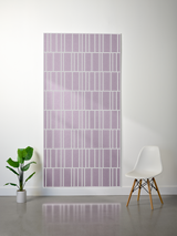 Mauve felt sheet with white engraved vertical line pattern creating offset rectangular sections.