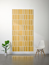 Gold and white felt sheet with offset engraved rectangular pattern in vertical lines.