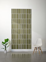 Olive green felt sheet with white offset geometric line pattern creating rectangular sections.