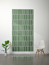 Green felt sheet with white engraved vertical and horizontal lines creating an offset grid pattern.