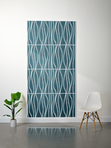 Teal felt sheet with white engraved wavy line pattern arranged in four rectangular panels.