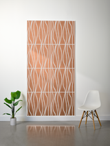 Terracotta felt sheet with white engraved wavy line pattern and layered grid divisions.