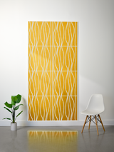 Mustard yellow felt sheet with white engraved wavy line pattern in grid sections.