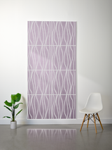 Lavender felt sheet with white engraved wavy line pattern arranged in four layered panels.