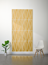 Rectangular felt sheet in golden yellow with white wavy line engraved pattern, divided into four sections by horizontal lines