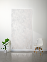 Light gray felt sheet with engraved wavy line pattern divided into four rectangular sections.