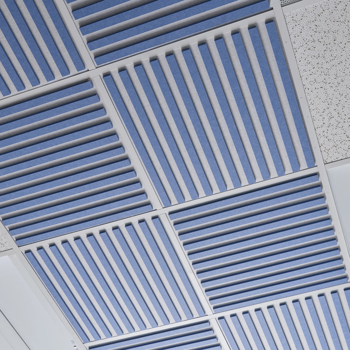 Blue Felt Slat drop ceiling tiles with raised felt slats in a ceiling grid