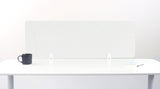 White desk divider with frosted panels mounted on white desk brackets, positioned between workspace items.