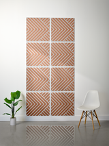 Eight terracotta and white tiles arranged in a grid with engraved diagonal chevron patterns.