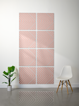 Eight square tiles with coral and gray engraved chevron and geometric line patterns arranged in a grid.