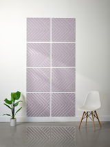 Eight purple tiles with white engraved chevron and diagonal line patterns arranged in a 4x2 grid on a wall.