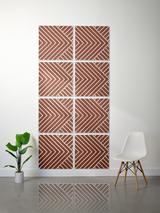 Eight terracotta and white tiles with chevron and diagonal stripe engraved patterns arranged in a 4x2 grid.