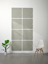 Eight sage green tiles with engraved diagonal chevron pattern arranged in a 2x4 grid on white wall.