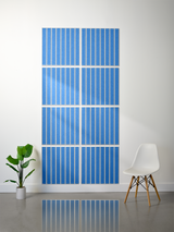 Eight blue tiles with white parallel vertical stripe engravings arranged in a 2x4 grid on a wall.