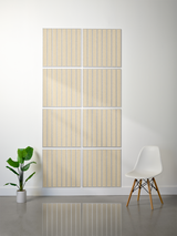 Eight square tiles with vertical parallel line engravings arranged in a 2x4 grid on white wall.