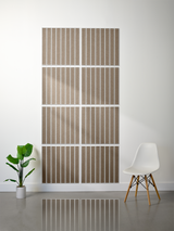 Eight square tiles with engraved parallel vertical lines and layered beige and white striped pattern.