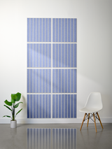 Eight blue square tiles with vertical engraved parallel lines arranged in a 2x4 grid on white wall.