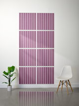 Eight mauve tiles with white parallel line engravings arranged in a 4x2 grid on a wall.