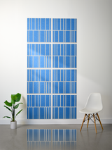 Eight blue tiles with white engraved vertical lines in offset pattern arrangement.