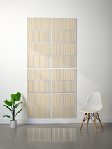 Eight beige tiles with vertical engraved lines arranged in offset pattern on wall.