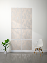 Eight beige tiles with engraved wavy line pattern arranged in a 2x4 grid on wall.