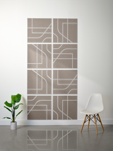 Eight taupe tiles arranged in a 2x4 grid with white engraved lines forming geometric and curved patterns.