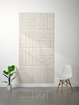 Eight beige square tiles with blue engraved geometric lines arranged in a wall grid pattern.