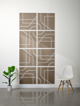 Eight taupe square tiles arranged in a 2x4 grid with white engraved subway-style lines and curved geometric patterns.