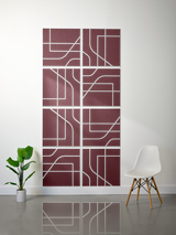 Eight burgundy tiles with white engraved geometric lines and curved patterns arranged in a 2x4 grid on a wall.