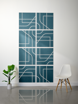 Eight teal subway tiles with white engraved geometric lines and curved patterns arranged in a 2x4 grid.