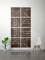 Eight brown tiles with white engraved geometric and curved line patterns arranged in a 2x4 grid.