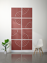 Eight red and white tiles with engraved geometric patterns of vertical lines and curved shapes arranged in a 2x4 grid.