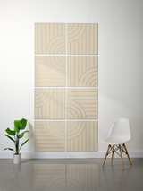 Eight beige tiles with engraved curved and linear patterns arranged in a 2x4 grid on a wall.