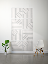 Set of eight square tiles with engraved vertical lines and curved geometric patterns creating a tangent design.