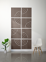 Eight brown tiles with white engraved vertical lines and curved geometric patterns arranged in a 2x4 grid.