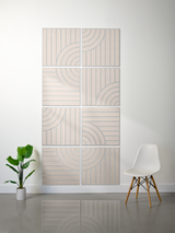 Eight square tiles with engraved vertical lines and curved arc patterns in beige and gray tones arranged in a grid.
