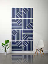 Eight dark blue tiles with white engraved vertical lines and curved arc patterns arranged in a 2x4 grid.