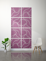 Eight purple tiles with white topographic contour line engraving arranged in a 2x4 grid on a wall.