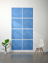 Set of eight blue tiles with white engraved vertical lines and concentric arch patterns arranged in a 2x4 grid.
