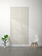Eight square tiles with engraved concentric arch and vertical line patterns in beige and gray tones.