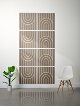 Eight taupe tiles with white engraved geometric arch and line patterns arranged in a 2x4 grid.