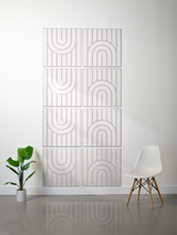 Eight light gray tiles with vertical lines and engraved concentric arch patterns arranged in a 2x4 grid.