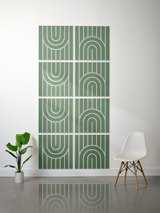 Eight green tiles with white engraved geometric arch and vertical line patterns arranged in a 2x4 grid.